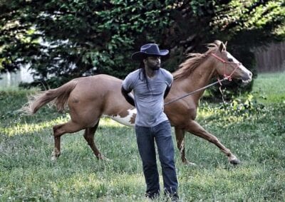 Jadon Relaford next to Horse